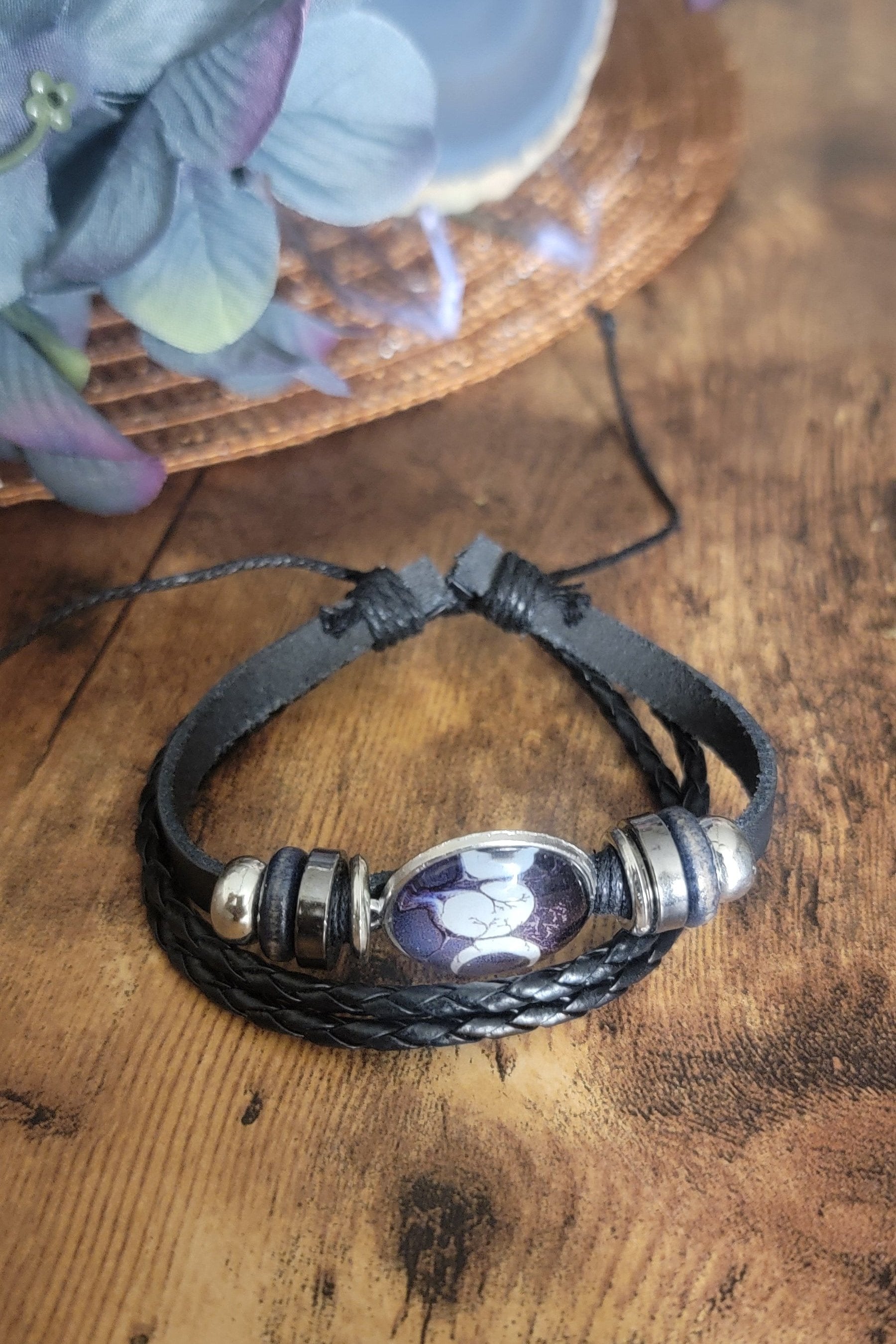 All black Triple cord leatherette, adjustable bracelet with black and Chrome beads and a triple moon with trees center adornment