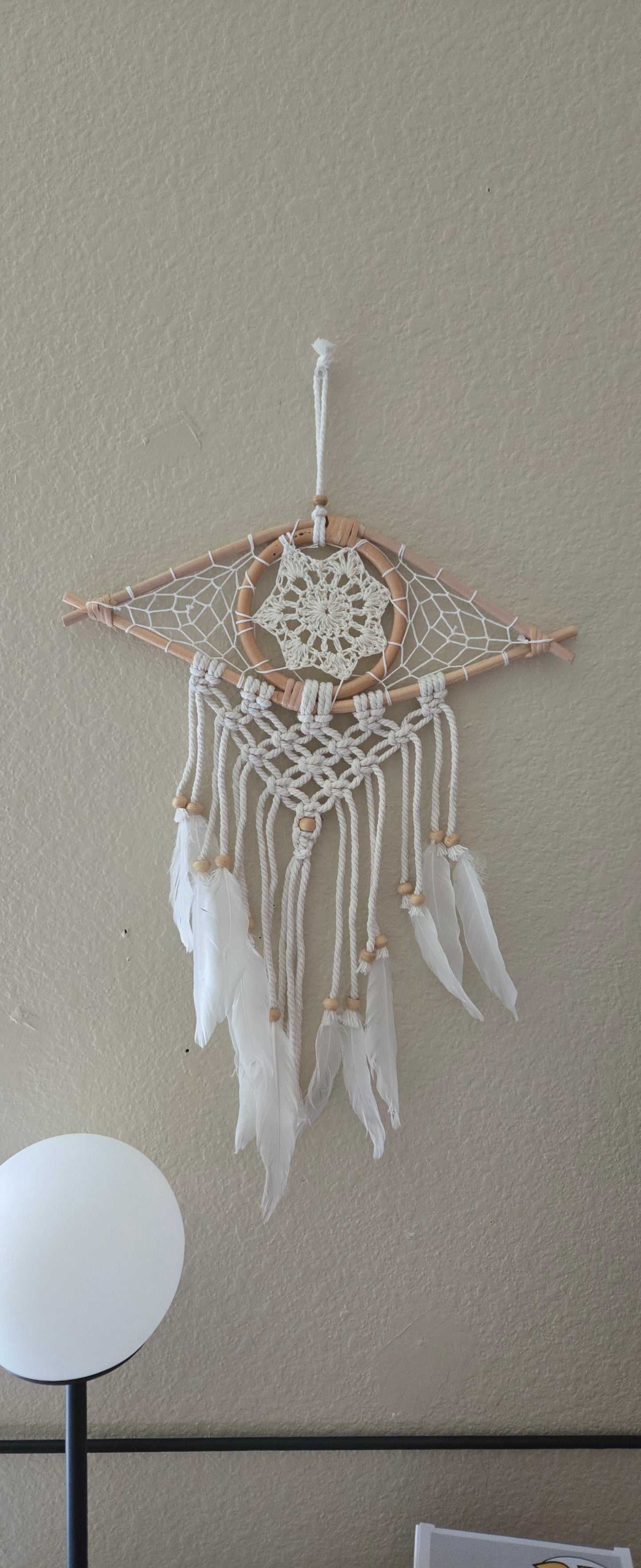 Decorative dreamcatcher with feathers