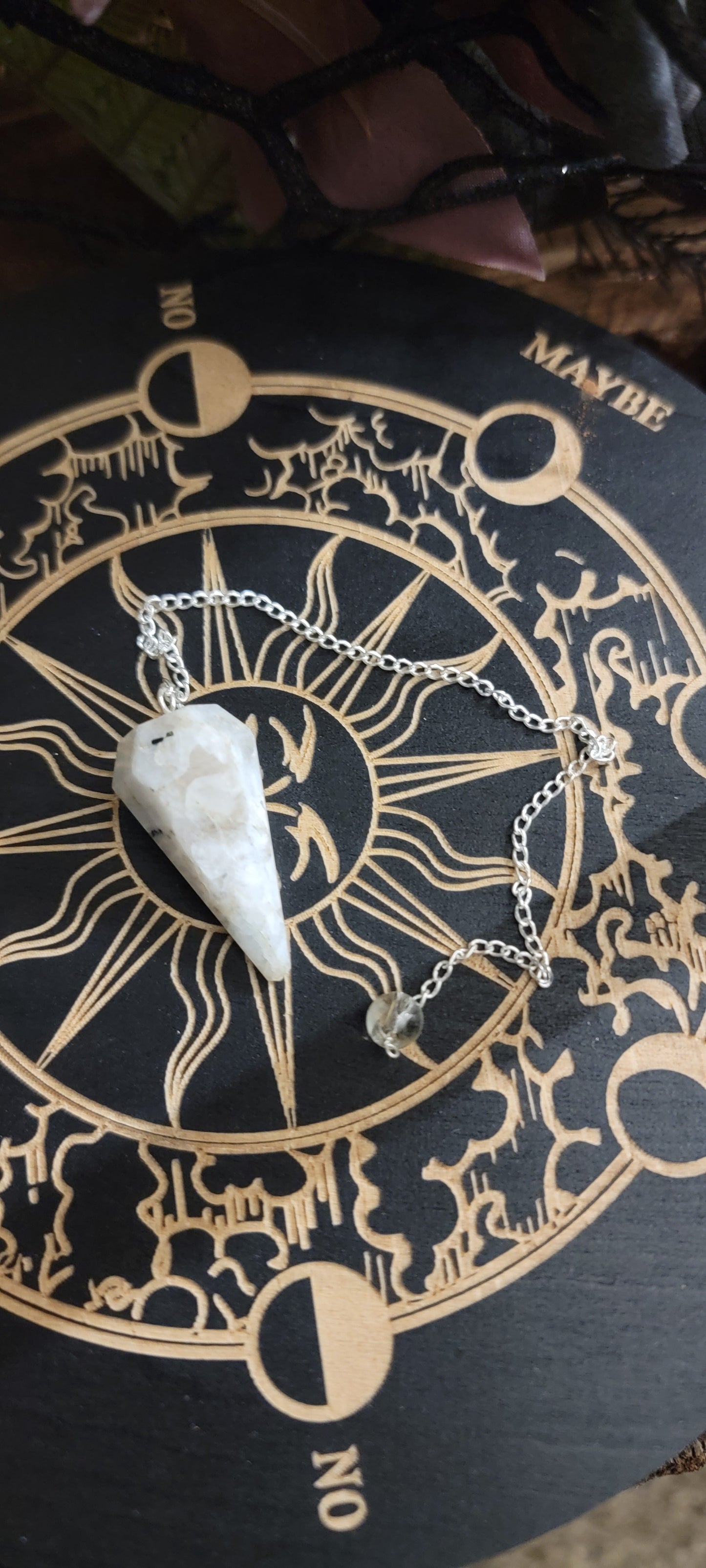 Rainbow moonstone, crystal smooth pointed pendulum on a chrome chain