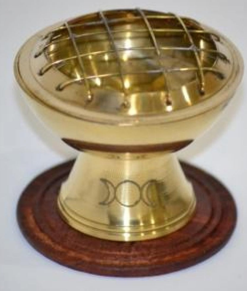 Brass pedestal charcoal burner with a triple moon, simple etched onto the base