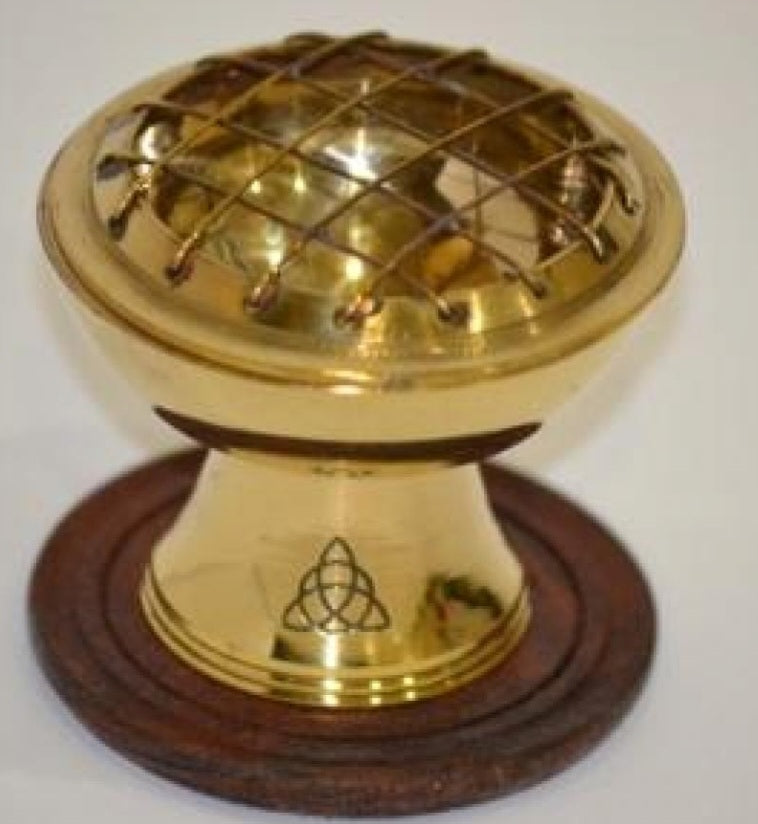Brass pedestal charcoal burner with triquetra symbol etched onto the base