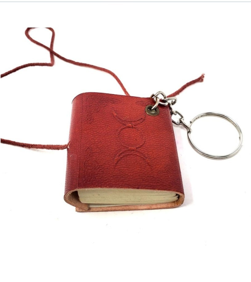 Leather spell book keychain, with triple moon symbol stampeded
