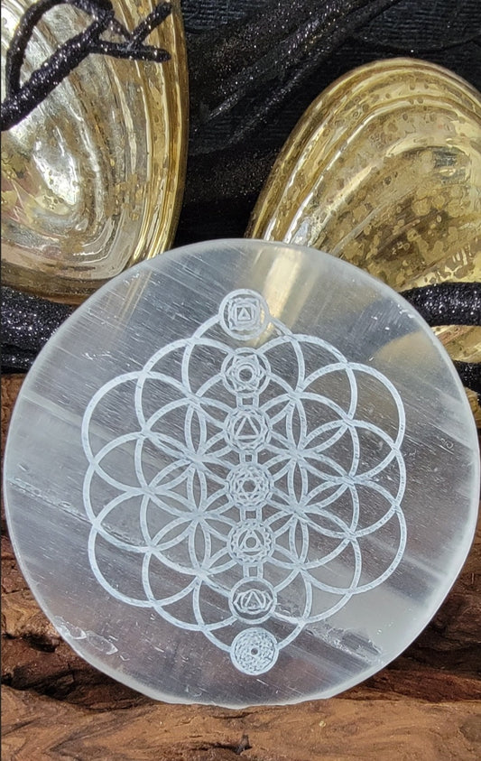 Selenite linite plate with flower of life and shock or symbols engraved