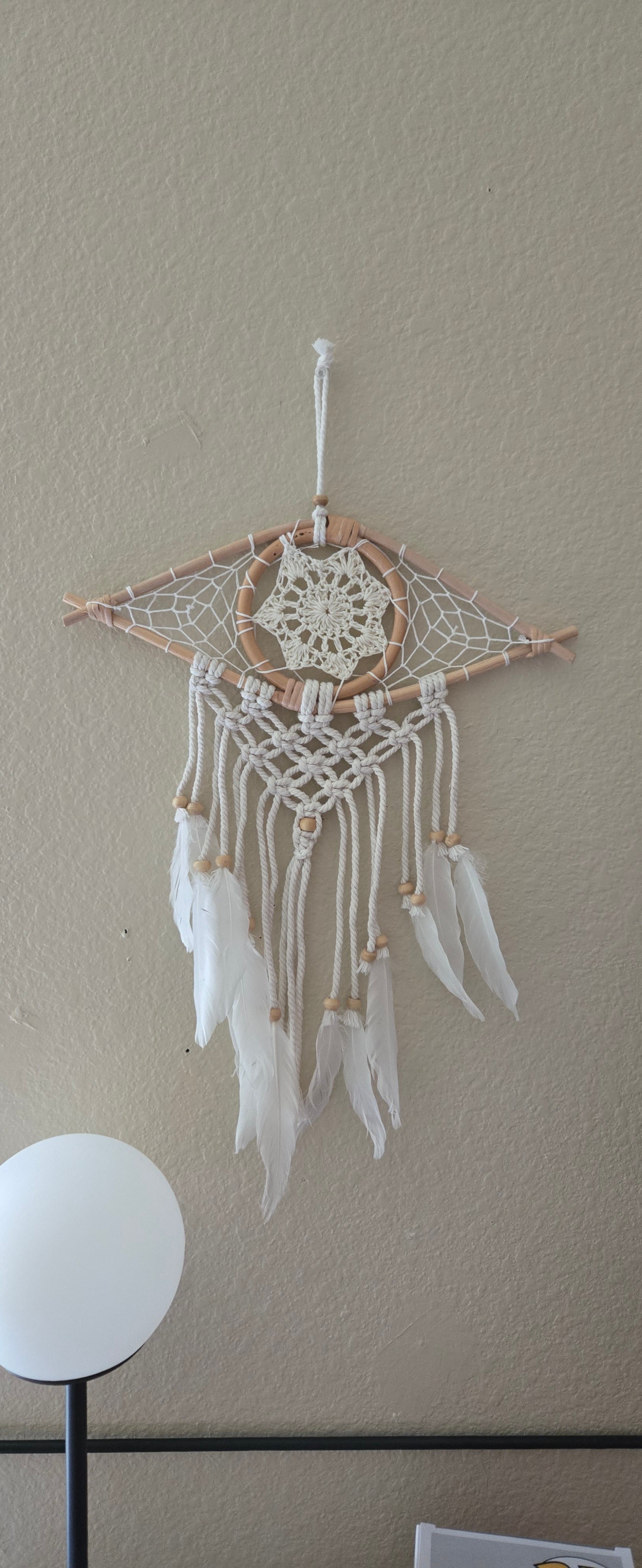 Decorative dreamcatcher with feathers