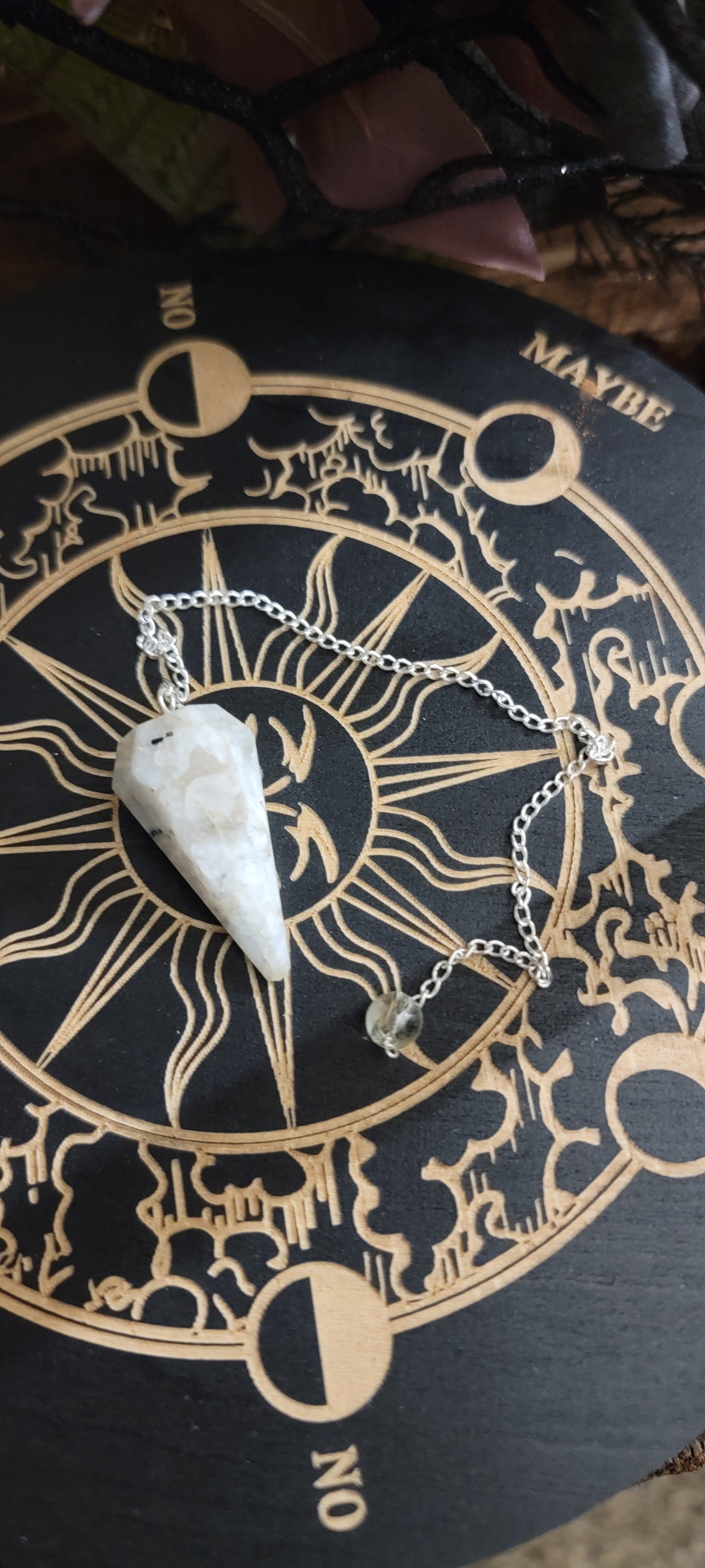 Rainbow moonstone, crystal smooth pointed pendulum on a chrome chain