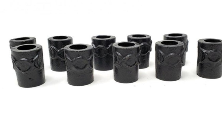 Cast iron chime candle holder with triple moon symbol